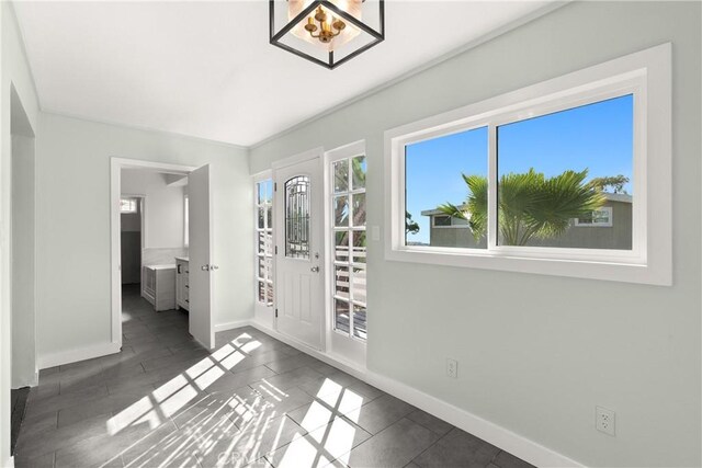 31955 10th Ave, Laguna Beach, CA 92651 - foyer entrance featuring baseboards and dark tile patterned flooring