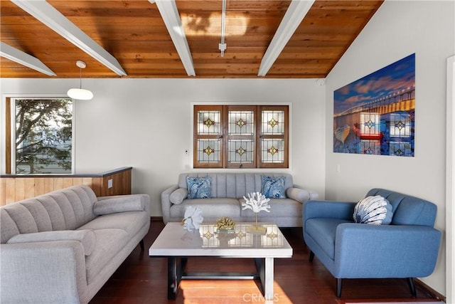 living room with vaulted ceiling with beams, wooden ceiling, and dark hardwood / wood-style floors