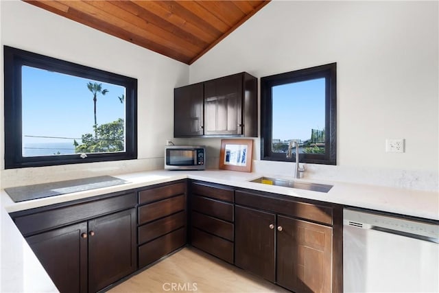 31955 10th Ave, Laguna Beach, CA 92651 - kitchen featuring appliances with stainless steel finishes, a sink, vaulted ceiling, light countertops, and wooden ceiling