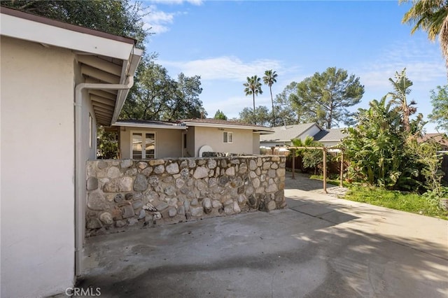 view of patio / terrace with fence