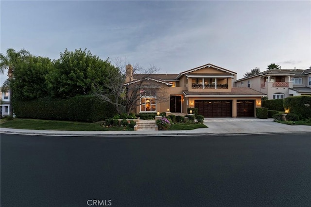 view of front of property featuring a garage