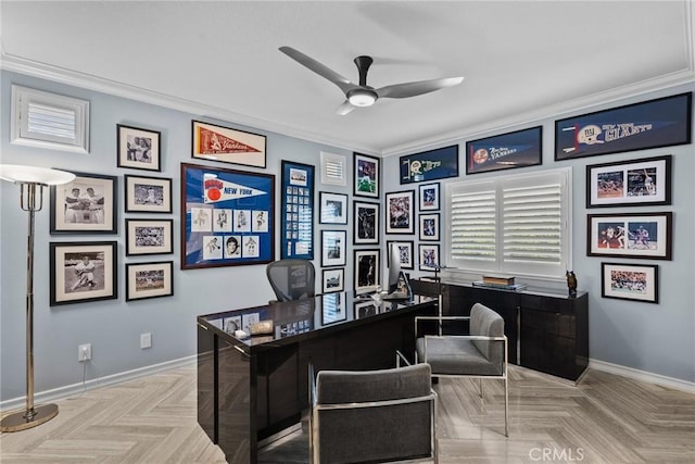 home office featuring light parquet flooring, ornamental molding, and ceiling fan