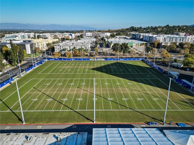 birds eye view of property featuring a mountain view