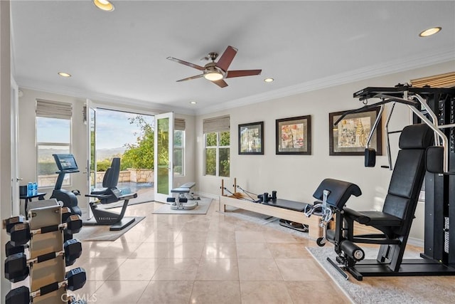 workout room featuring light tile patterned flooring, ornamental molding, and ceiling fan