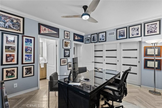 home office with ceiling fan, ornamental molding, and light parquet floors