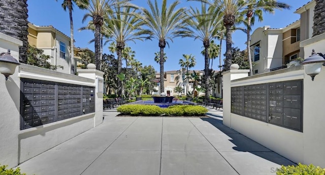 view of home's community featuring mail boxes