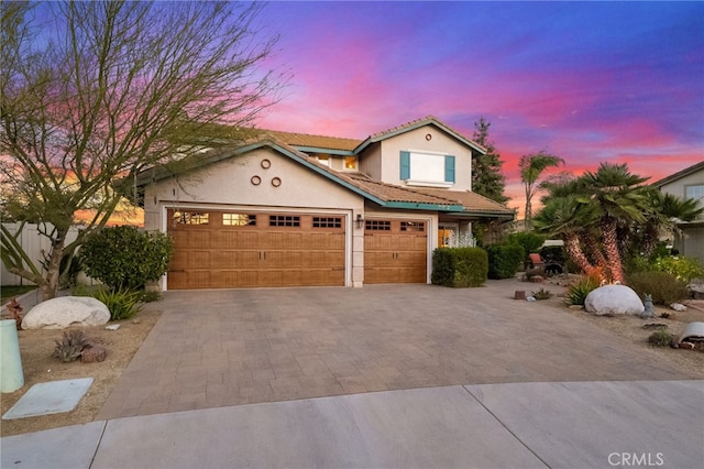 view of front of home with a garage