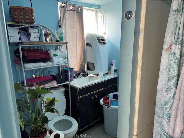 bathroom with tile patterned floors