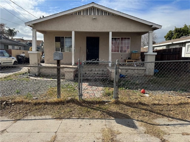 bungalow-style house with covered porch