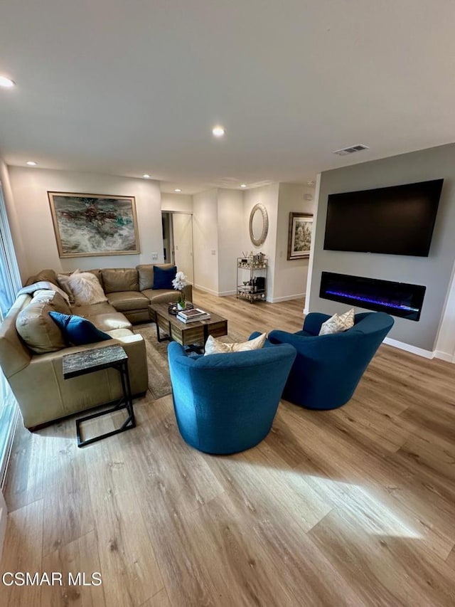 living room with light wood-type flooring