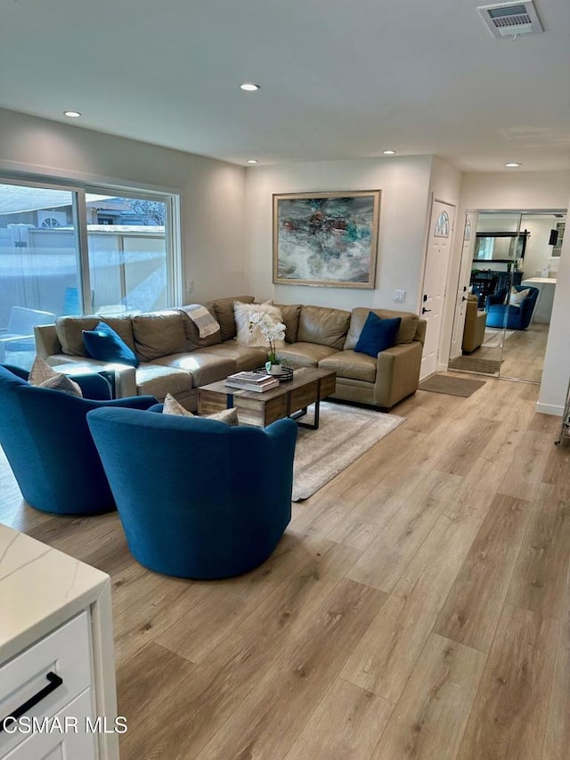 living room featuring light hardwood / wood-style flooring