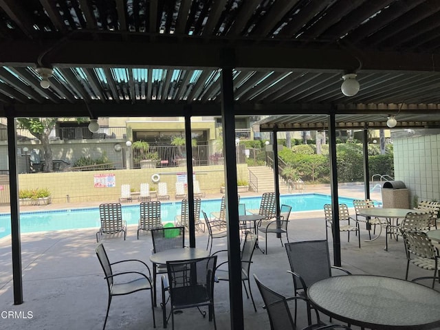 view of swimming pool featuring a patio