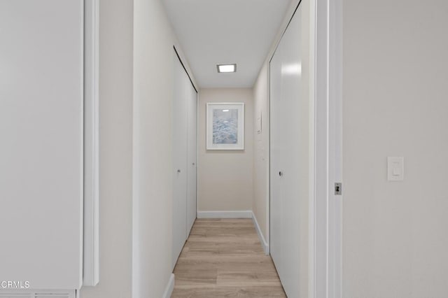 hallway featuring light hardwood / wood-style flooring