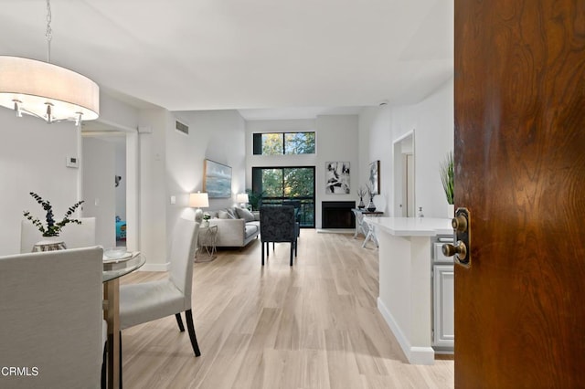 dining space featuring light hardwood / wood-style floors