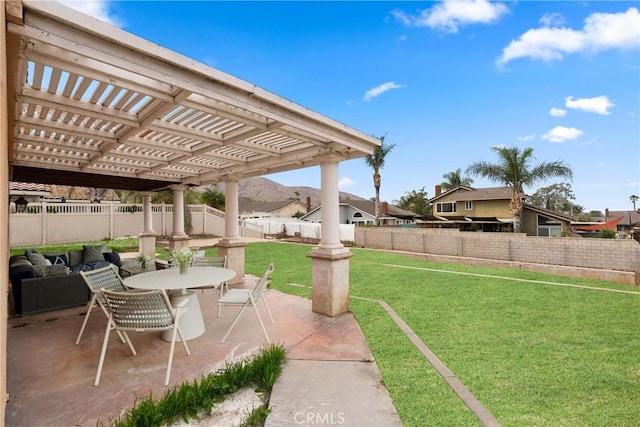 view of yard featuring a patio, a fenced backyard, and a pergola