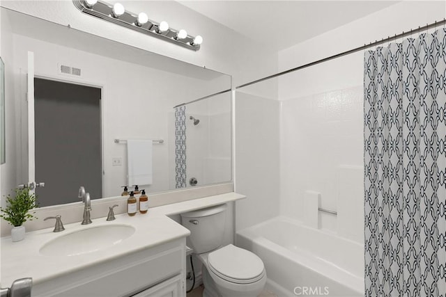 bathroom with shower / bath combo with shower curtain, toilet, vanity, and visible vents