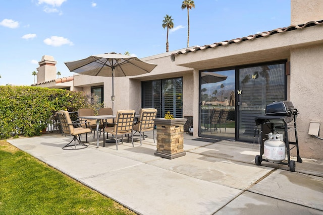 view of patio with a grill