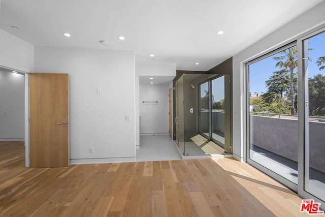 spare room featuring light hardwood / wood-style flooring