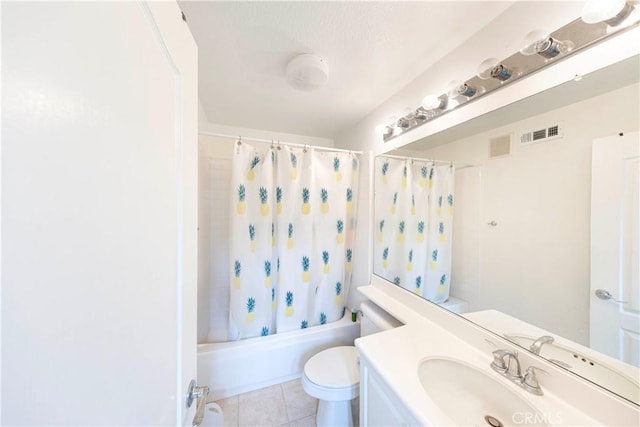 full bathroom with vanity, tile patterned floors, toilet, and shower / bath combo