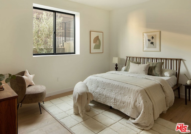 bedroom featuring light hardwood / wood-style floors