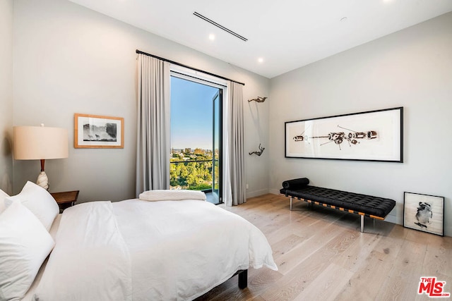 bedroom featuring light wood-type flooring