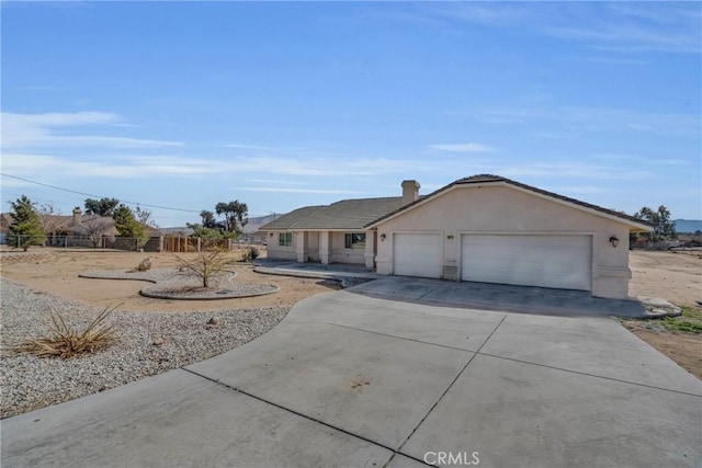 single story home featuring a garage