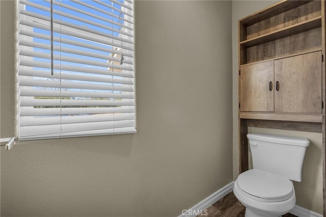 bathroom featuring toilet