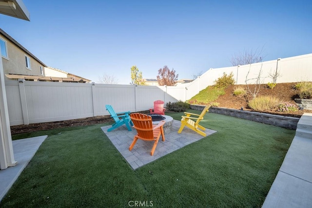 view of yard featuring a patio area and a fire pit