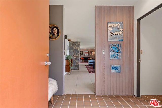 corridor with tile patterned flooring