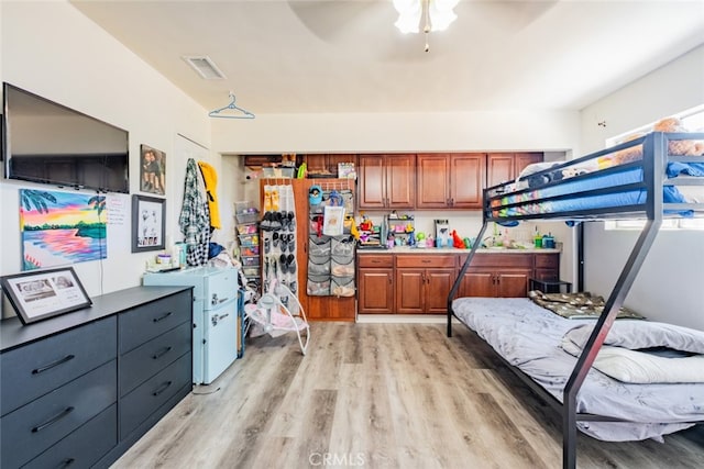 bedroom featuring light hardwood / wood-style floors