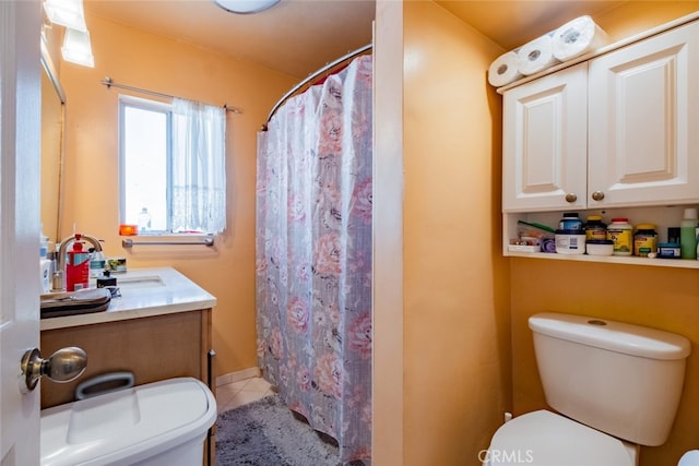 bathroom with vanity, tile patterned flooring, toilet, and a shower with shower curtain