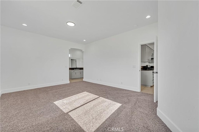 view of carpeted spare room