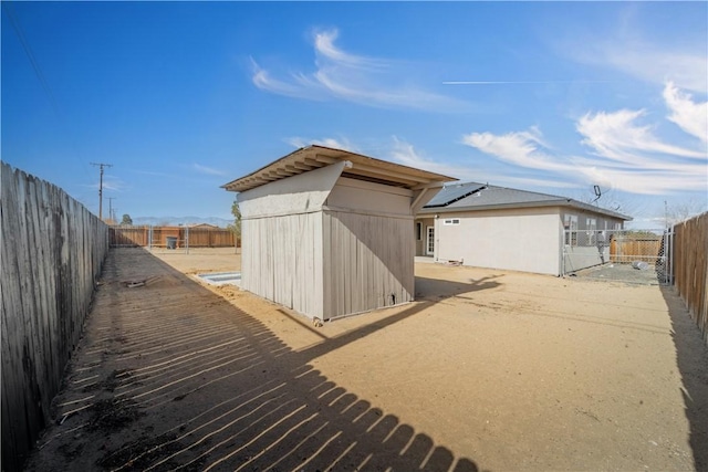 exterior space featuring solar panels