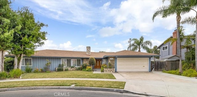 single story home featuring a garage, a front yard, driveway, and fence