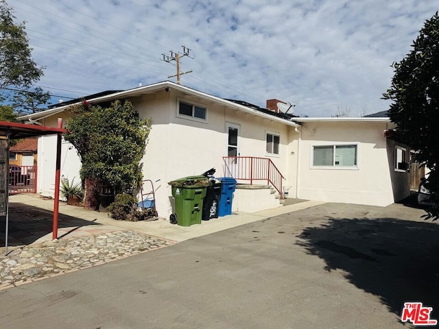 rear view of house featuring a patio area