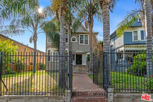 view of front of home with a front yard