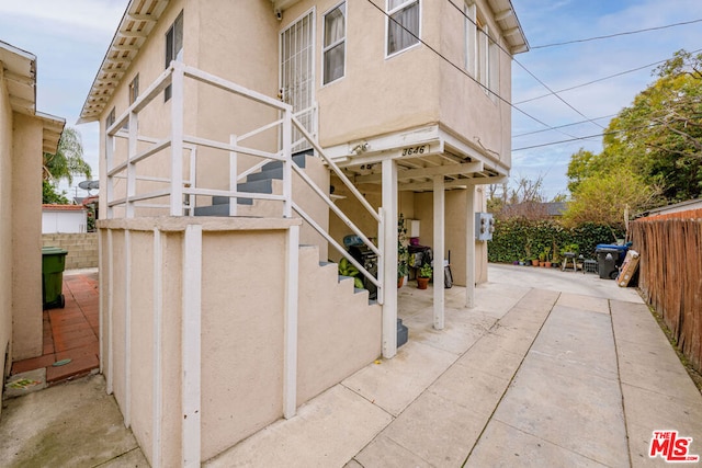 view of home's exterior featuring a patio area