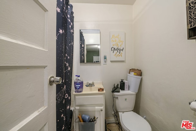 bathroom featuring toilet