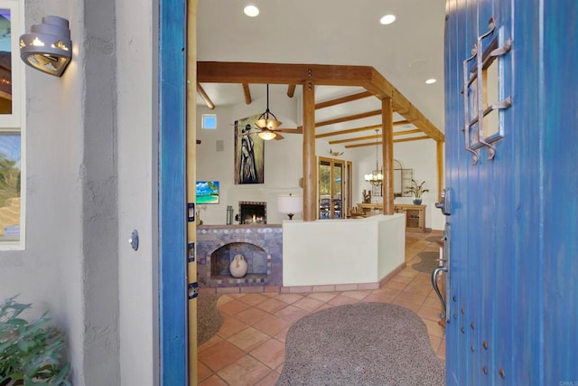 foyer entrance featuring recessed lighting, a brick fireplace, light tile patterned flooring, and vaulted ceiling with beams