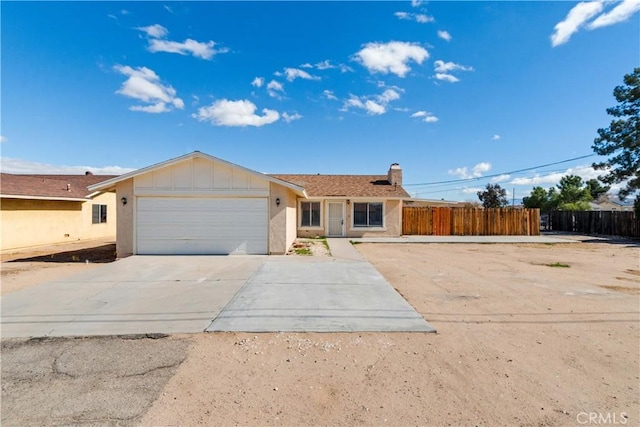 single story home with a garage