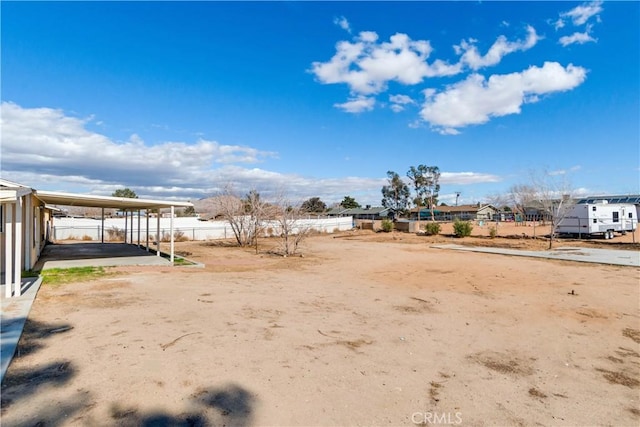 view of yard with a carport