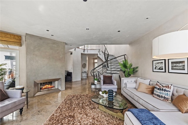 living room with a large fireplace