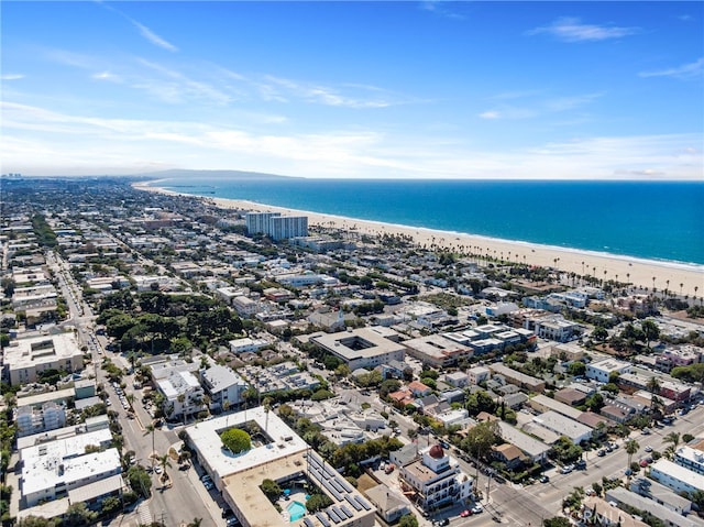 aerial view featuring a water view and a beach view