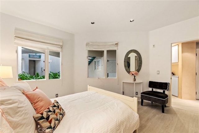 bedroom featuring light hardwood / wood-style floors