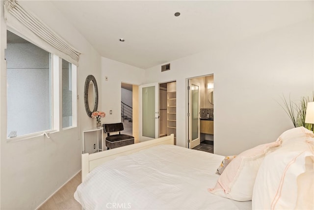 bedroom with ensuite bath