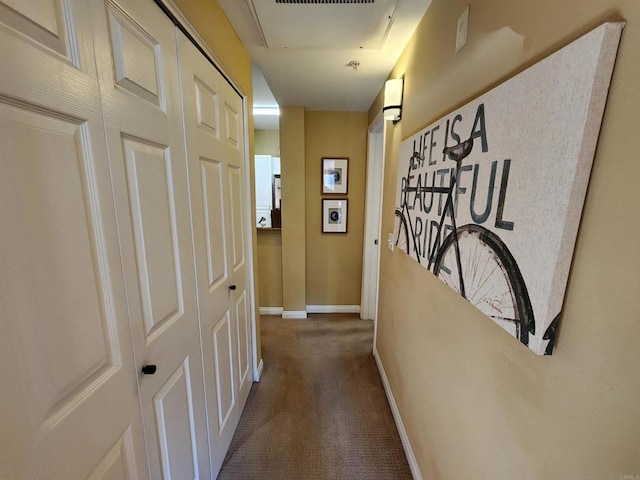 hallway featuring carpet floors