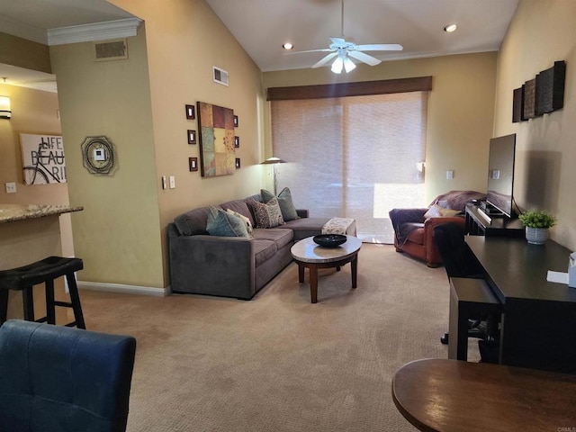 carpeted living room featuring crown molding, lofted ceiling, and ceiling fan