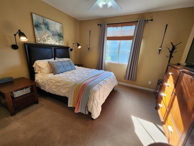 bedroom with ceiling fan and carpet