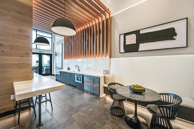 interior space with french doors and sink