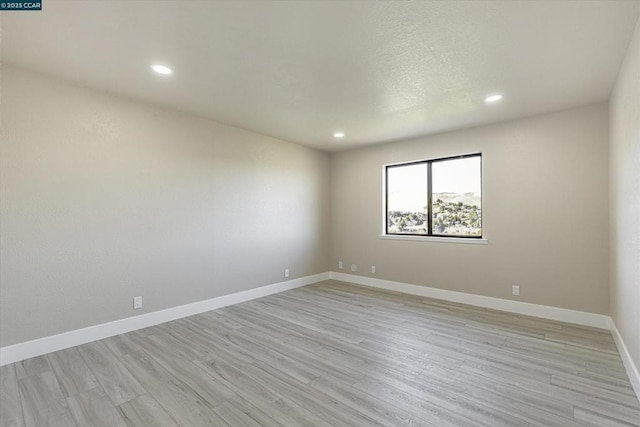 empty room featuring light wood-type flooring